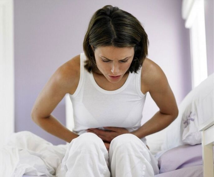 A woman is worried about the symptoms of helminth infection